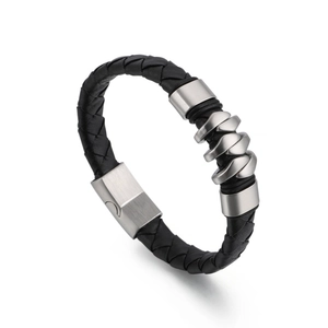 Men's black braided leather bracelet with skull-style silver metal links and magnetic clasp