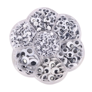 Flower-shaped organizer with black and white googly eyes for DIY doll making