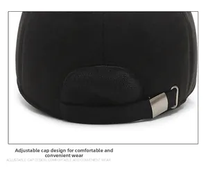 Macro detail of the adjustable metal buckle and rear strap on a winter wool baseball cap