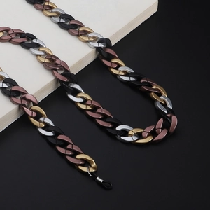 Detail of matte acrylic eyeglass chain in gold silver and black with rubber loops