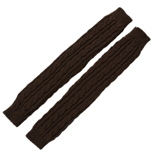 Detail shot of brown cable-knit arm warmers showing thick knit texture and braided pattern