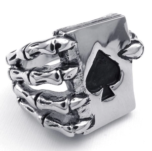 Punk skeleton hand ring holding an Ace of Spades card in silver-tone finish