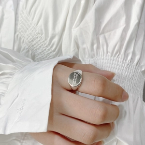 Detail of 925 sterling silver signet ring with Some kind of Wonderful engraving