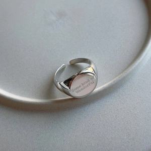 Macro shot of 925 sterling silver signet ring with Some kind of Wonderful engraving