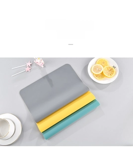 Detail of Morandi-colored heat resistant silicone placemats with matte texture surface