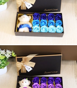 Macro view of rose soap flower gift box with plush bear and elegant gold ribbon details