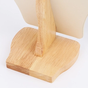 Portrait jewelry display stand with a solid wood base and beige velvet necklace holder
