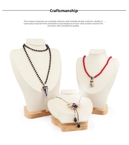 Detailed display of assorted necklaces on premium wooden base mannequin stands