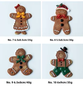 Detail view of 4 gingerbread man fridge magnets with size and weight dimensions