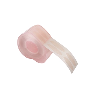 Invisible lace double eyelid tape in pink heart-shaped roll for natural makeup look