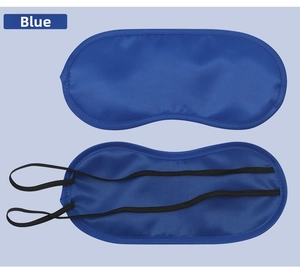 Detail view of navy blue polyester sleep mask showing high elastic straps and smooth texture