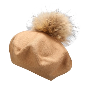 Classic camel wool knitted beret hat for women with a large fluffy pompom on top