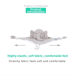 Close-up of soft gray plush elephant baby comforter with dual arrows showing high elasticity