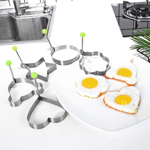 Thick stainless steel egg rings in heart and star shapes for creative breakfast cooking