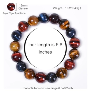 Natural 12mm tiger eye stone beaded bracelet with red blue and yellow gems on white background