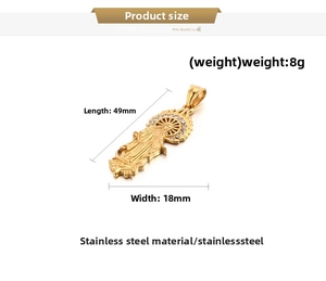 Macro view of gold stainless steel Virgin Mary pendant with dimensions 49mm x 18mm