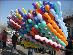 Outdoor shot showing colorful thickened spiral latex balloons for party decorations