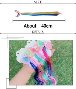 Detail showing 40cm rainbow hair extensions with sequin unicorn and bow hair clips