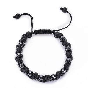 Close-up of triple-layer braided bracelet with lava stones and hematite beads