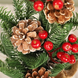 Mini Christmas tree with red berries, pine cones and burlap base for desk decor