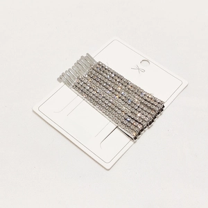Set of ten silver rhinestone hairpins with single-row crystals on white display card