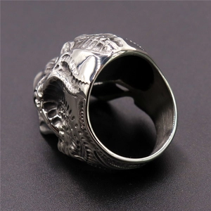 Gothic punk style stainless steel skull ring with detailed silver metal carving texture