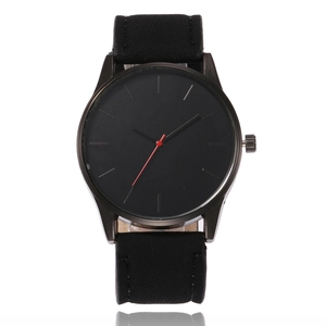 Minimalist black sports watch with large dial, red second hand and matte leather strap