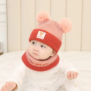 Winter baby knitted hat and scarf set with double fur pom-poms in pink and brown