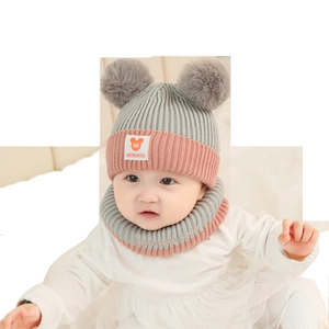 Winter baby knit hat and scarf set with double grey pom-poms for warmth and comfort