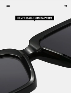 Detail shot of the comfortable integrated nose support on black thick frame sunglasses