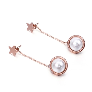Elegant rose gold star earrings with chain and white pearl drop on white background
