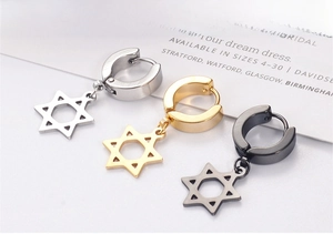Detailed shot of stainless steel hoop earrings with hanging hexagram star pendants