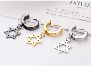 Detail view of hexagram star pendant earrings in black, gold, and silver stainless steel
