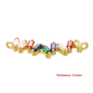 Macro detail of rainbow zirconia connector with multicolor rectangular stones and 3.5mm thickness