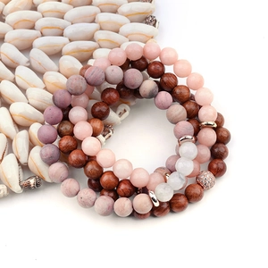 Bohemian multilayer beaded bracelet set with natural crystal stones and wooden beads on white