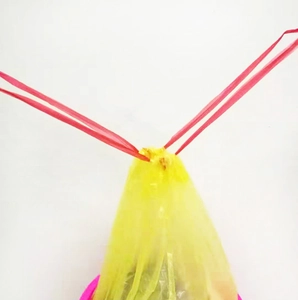 Detailed close-up showing the heavy-duty drawstring closure of thick kitchen trash bags