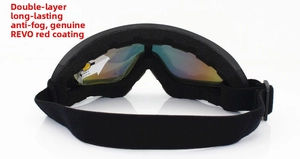 Detail view of double-layer anti-fog lenses and red REVO coating on ski goggles