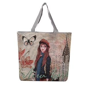 Detail van de geborduurde New York shopper met jacquardtextuur en gestreept handvat
