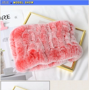 Detailed plush texture of pink faux rabbit fur neck warmer with wavy woven pattern