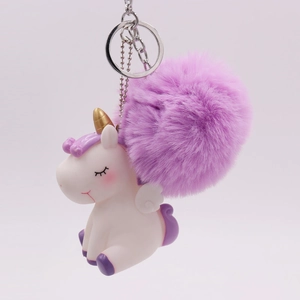 Cute unicorn keychain with purple faux fur pompom and metal ring for bag decoration