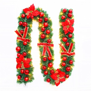 2.7m pre-lit Christmas garland with red poinsettias and gold bows for holiday decor