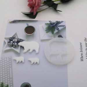 Macro detail of polar bear silicone mold with resin finished crafts on a lifestyle background