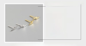 Detail showing S925 sterling silver lightning bolt earrings in silver and gold finishes