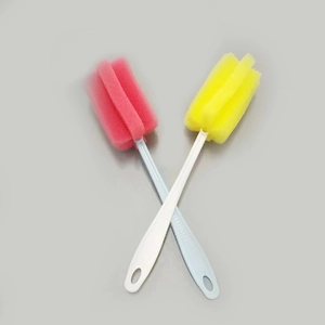 Detail of two durable sponge bottle brushes with pink and yellow heads and hanging loops