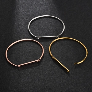 Minimalist C-shape bangles in gold, rose gold and silver finish with flat metal bars