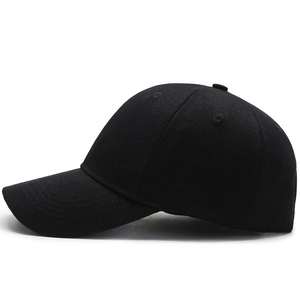 Minimalist black cotton baseball cap in six-panel style with breathable eyelets
