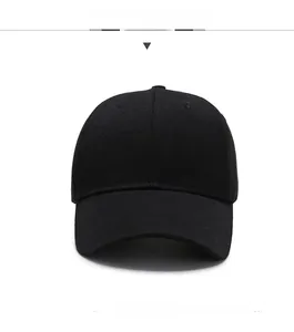 Close-up of black cotton baseball cap showing twill texture and curved brim detail