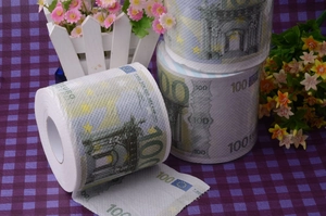 Detail of toilet paper roll featuring realistic 100 Euro bill print on purple background