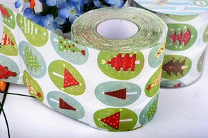Macro detail of Christmas tree pattern printed on 3-ply colorful toilet paper rolls