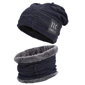 Detail showing the navy knit beanie and neck warmer with plush fleece lining for winter warmth